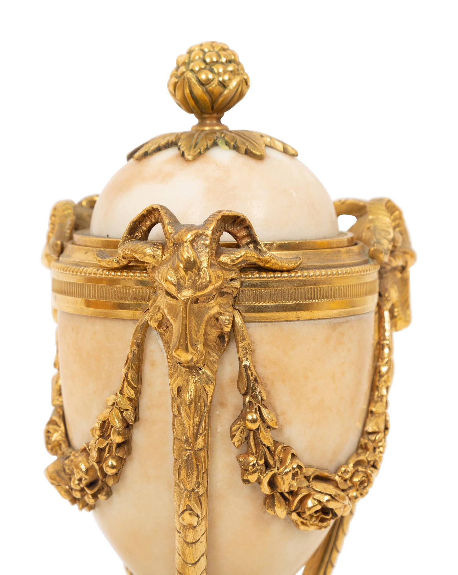 A Pair of Continental Gilt Bronze Mounted Marble Cassolettes