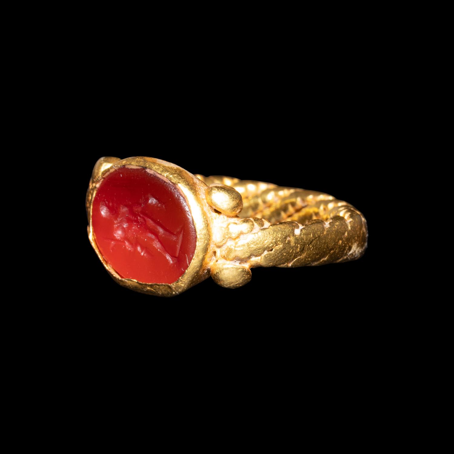 An Italic Carnelian Intaglio with Perseus — Set in a Late Roman gold ring