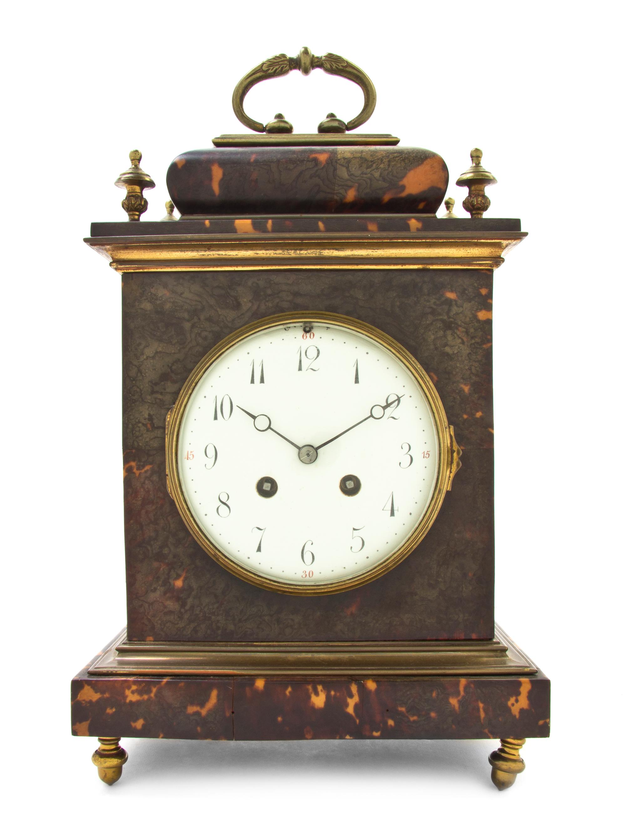 A Continental Tortoise Shell and Brass Mounted Bracket Clock, Height 13 3/8 x width 8 1/2 x depth 5 3/8 inches.