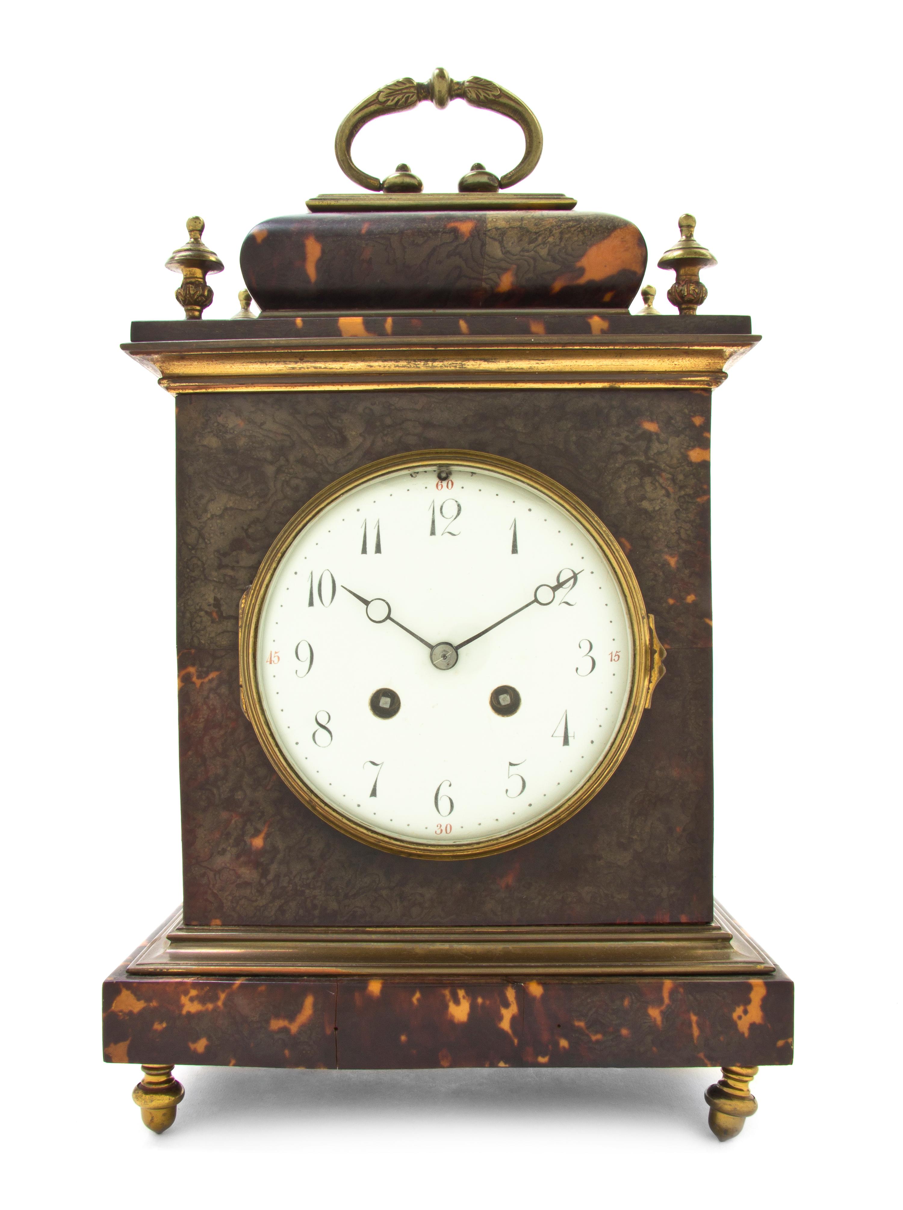 A Continental Tortoise Shell and Brass Mounted Bracket Clock, Height 13 3/8 x width 8 1/2 x depth 5 3/8 inches.