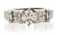 An 18 Karat White Gold and Diamond Ring, 3.60 dwts.