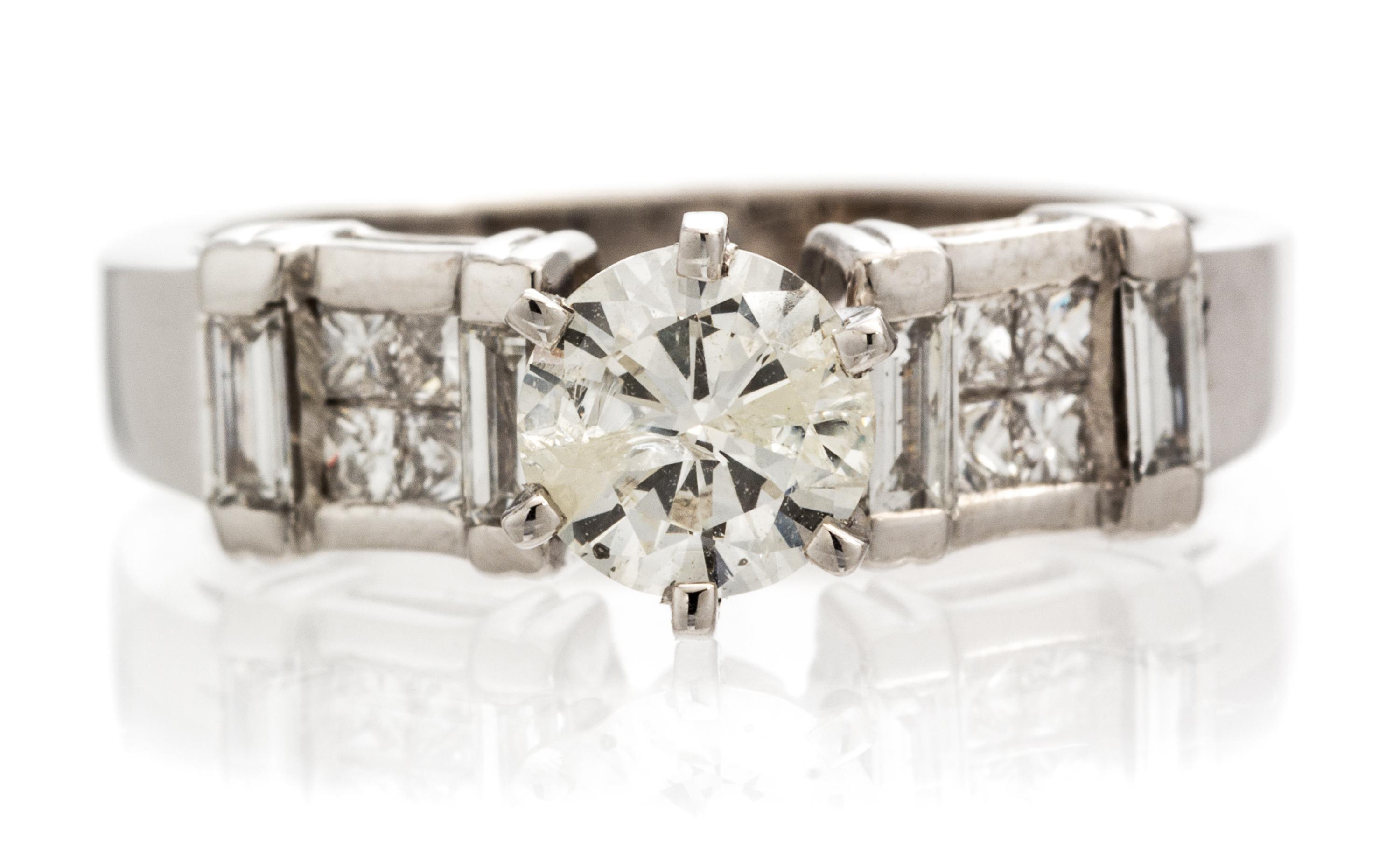 An 18 Karat White Gold and Diamond Ring, 3.60 dwts.