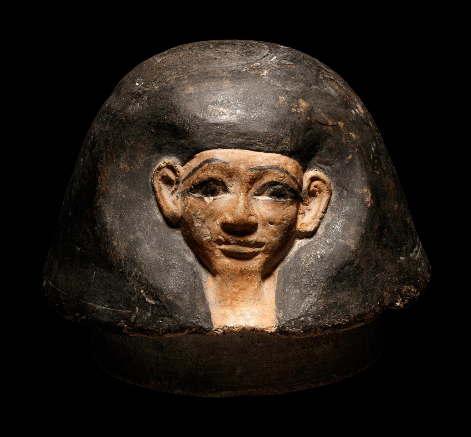 An Egyptian Canopic Jar Lid