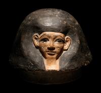 An Egyptian Canopic Jar Lid