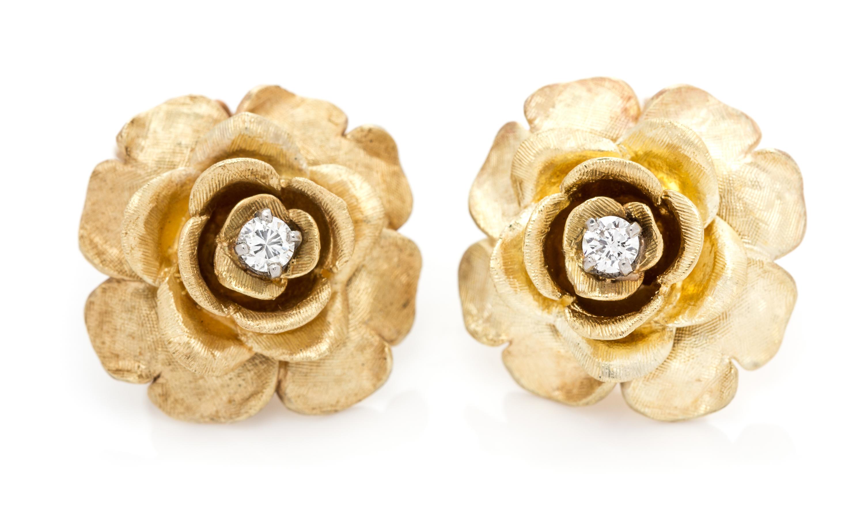 A Pair of 14 Karat Yellow Gold and Diamond Floral Motif Earclips, 9.40 dwts.