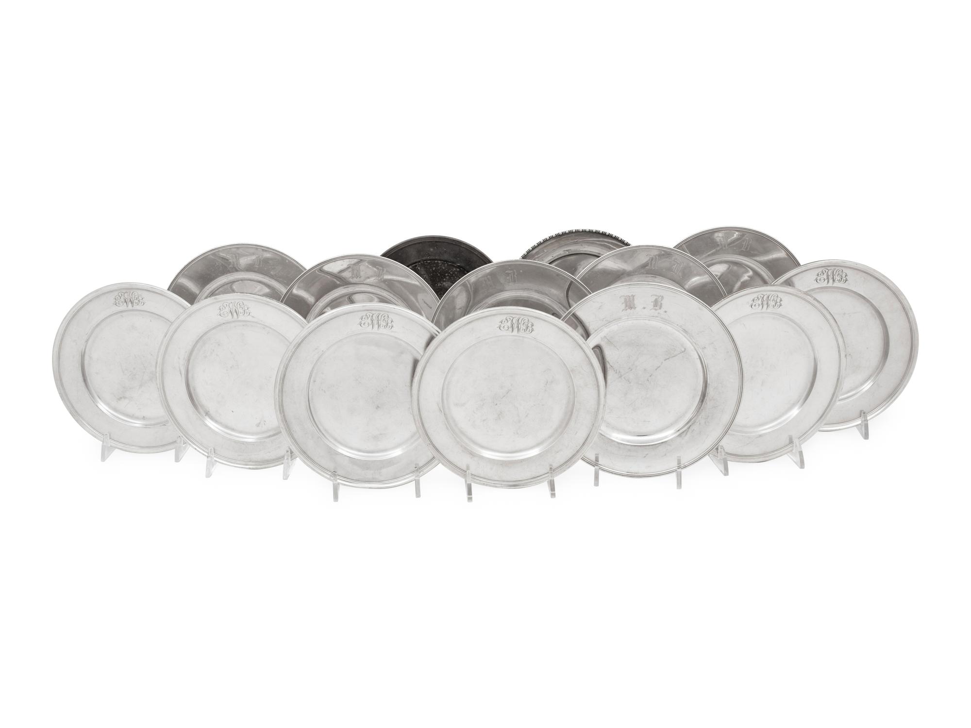 A Collection of American Silver Bread Plates