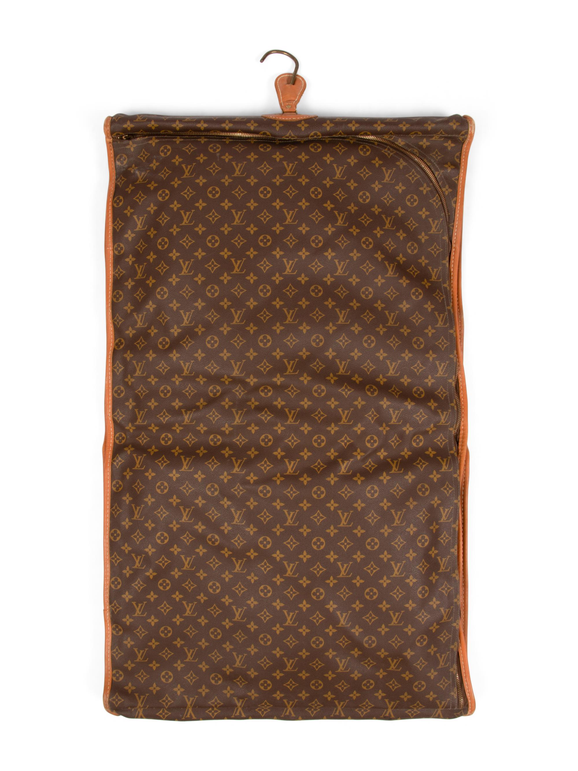 Four Louis Vuitton French Company Garment Bags, 1976-91