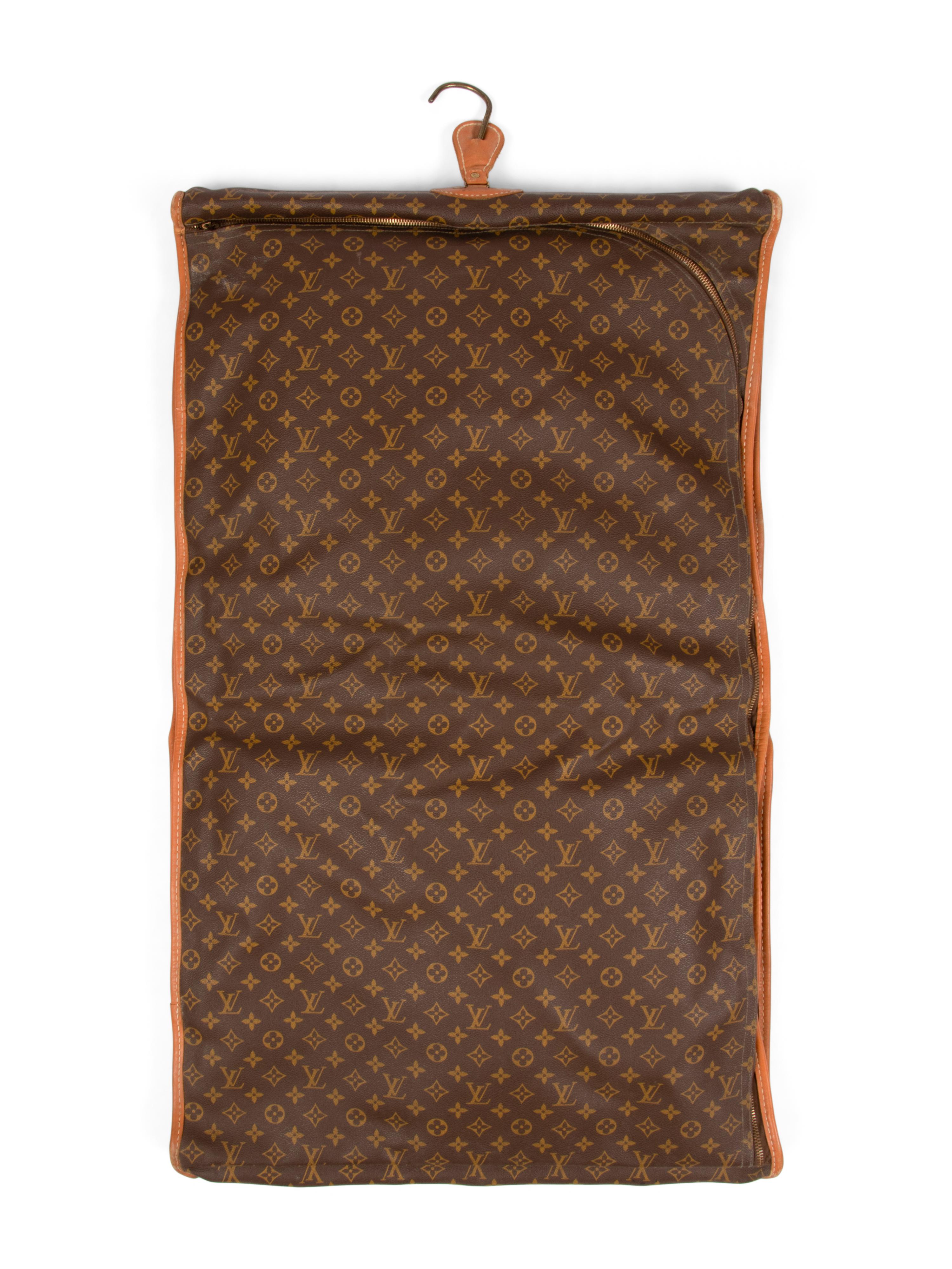 Four Louis Vuitton French Company Garment Bags, 1976-91