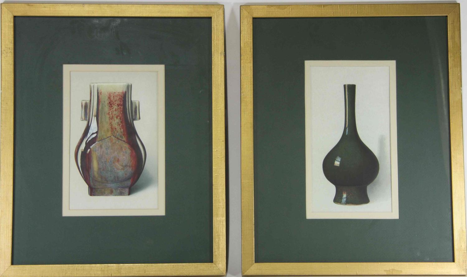 A Group of Four Ceramic Plates Height of tallest 22 1/2 inches.