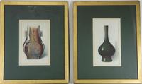 A Group of Four Ceramic Plates Height of tallest 22 1/2 inches.