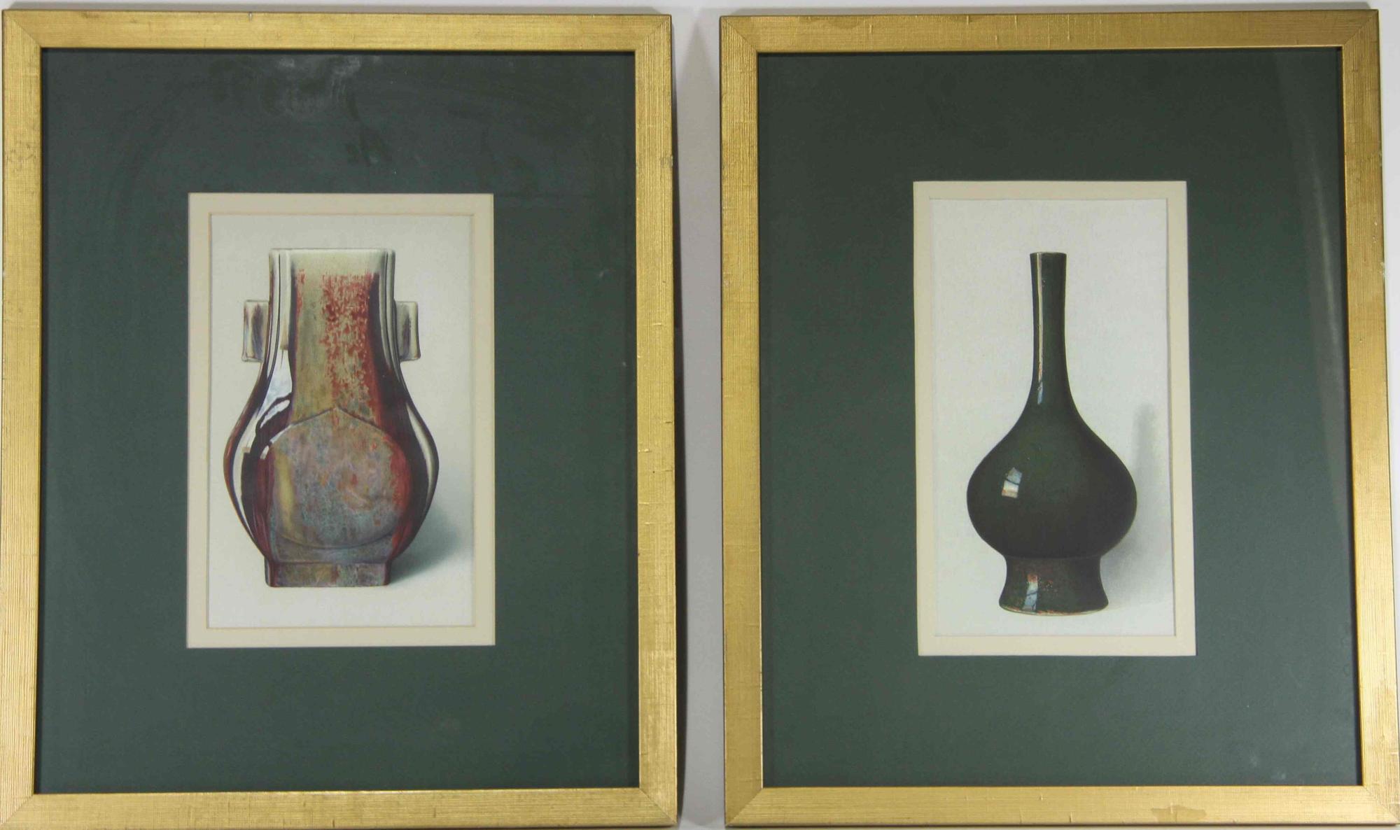 A Group of Four Ceramic Plates Height of tallest 22 1/2 inches.