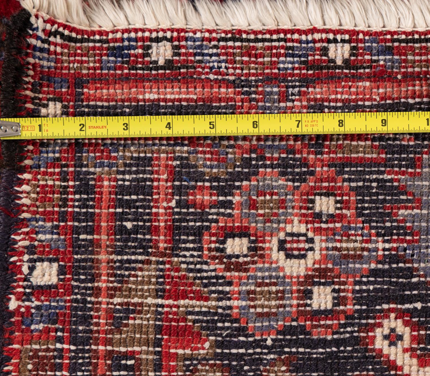 A Heriz Wool Rug
