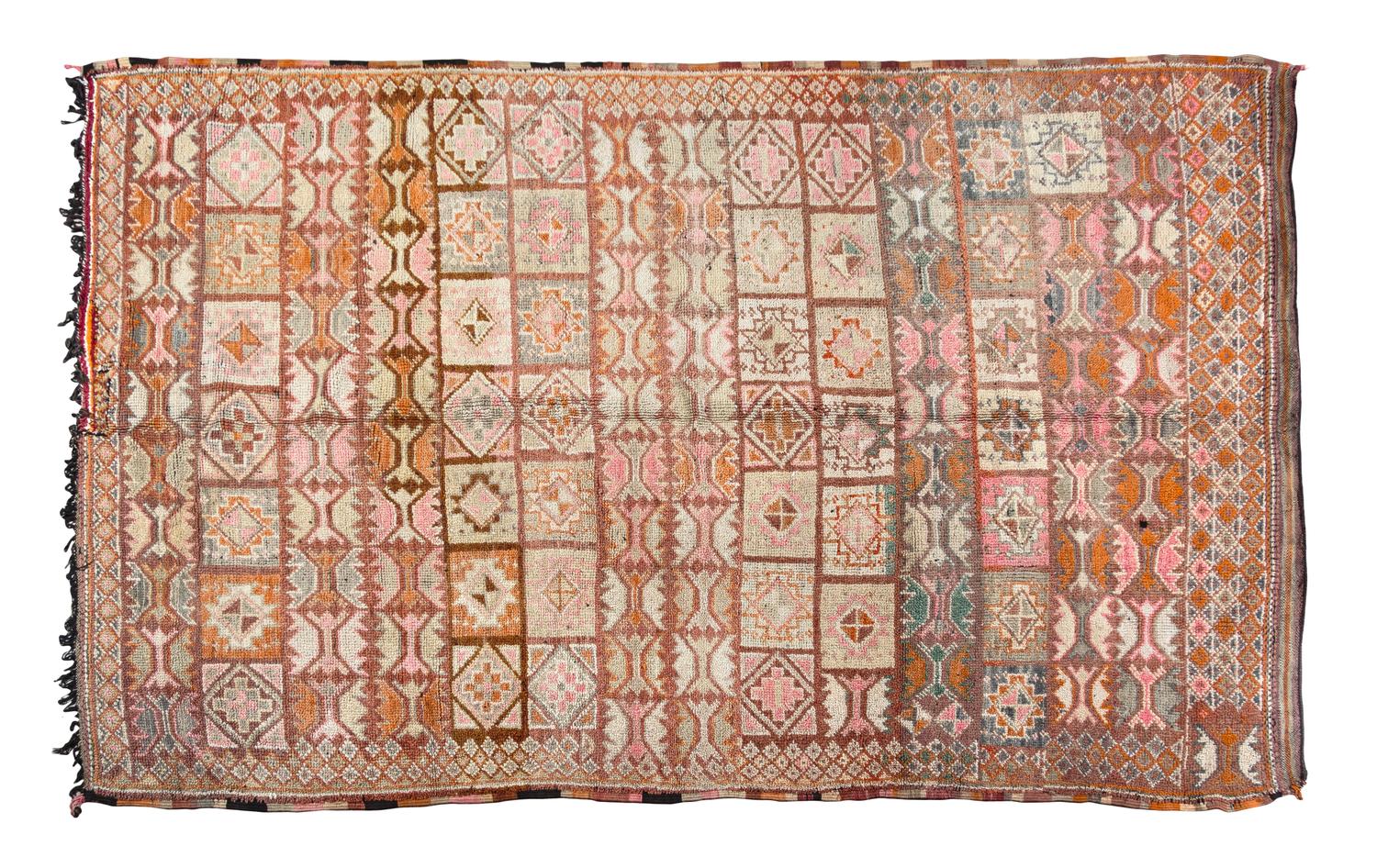 A Moroccan Hooked Rug 9 feet 1 inch x 5 feet 10 inches.