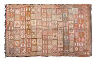 A Moroccan Hooked Rug 9 feet 1 inch x 5 feet 10 inches.