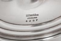 A Pair of S. Kirk and Son Silver Repoussé Compotes
