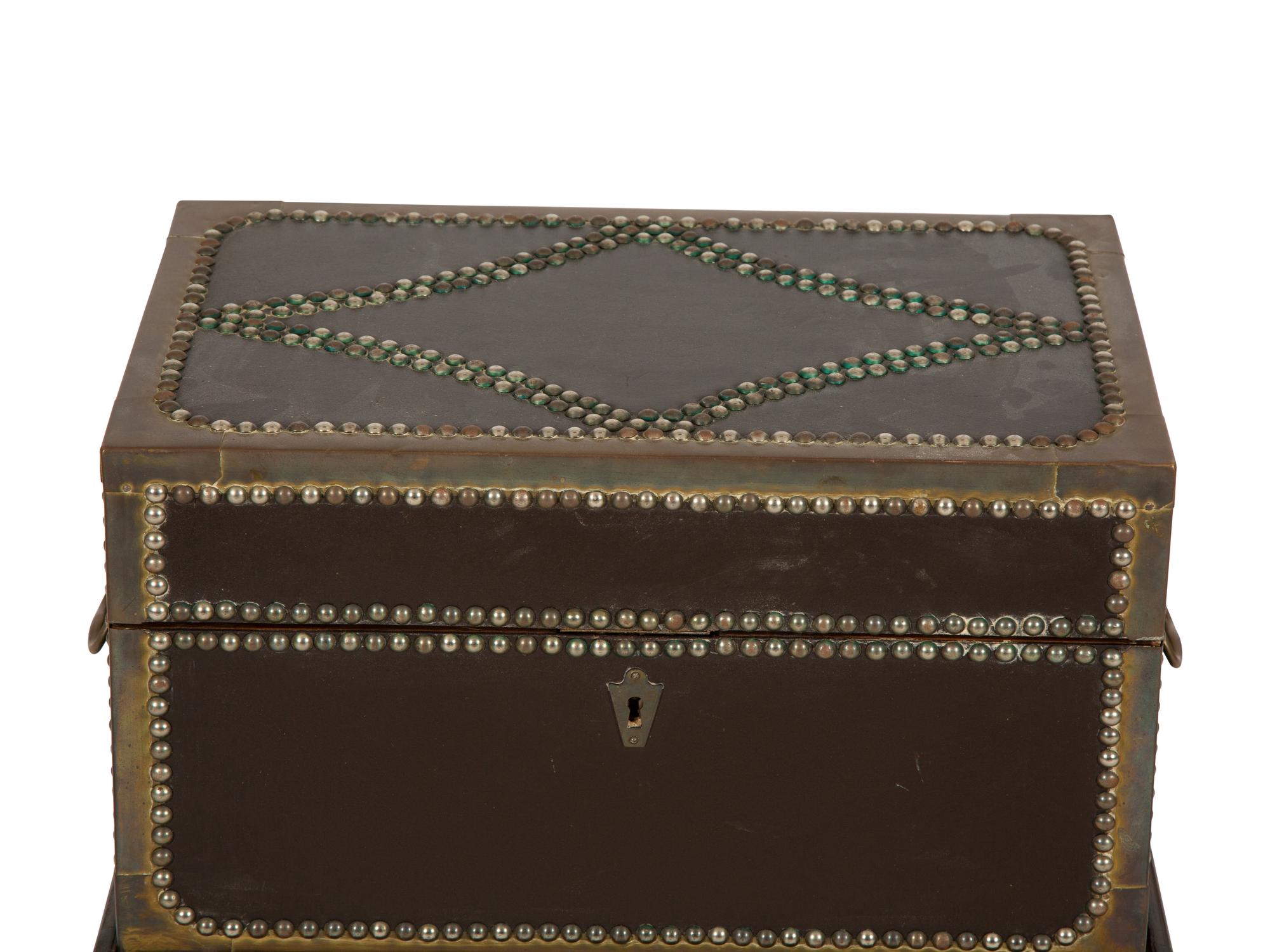 An English Brass Bound Leather Box with Brass Nailhead Trim on a Fitted Mahogany Stand
