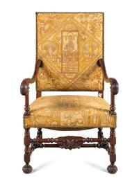 A William and Mary Style Carved Walnut Armchair