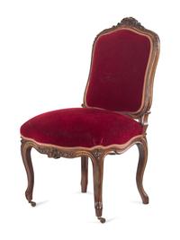 An Italian Louis XV Style Carved and Parcel Gilt Walnut Parlor Suite