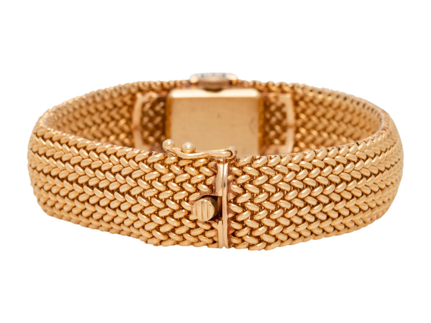 MOVADO, 14K YELLOW GOLD, DIAMOND AND SAPPHIRE SURPRISE WRISTWATCH