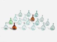 A collection of eighteen mold-blown colored glass calabash bottles, various makers, 19th century