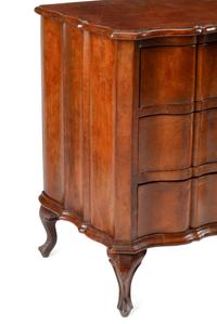 An Italian Walnut Three-Drawer Commode