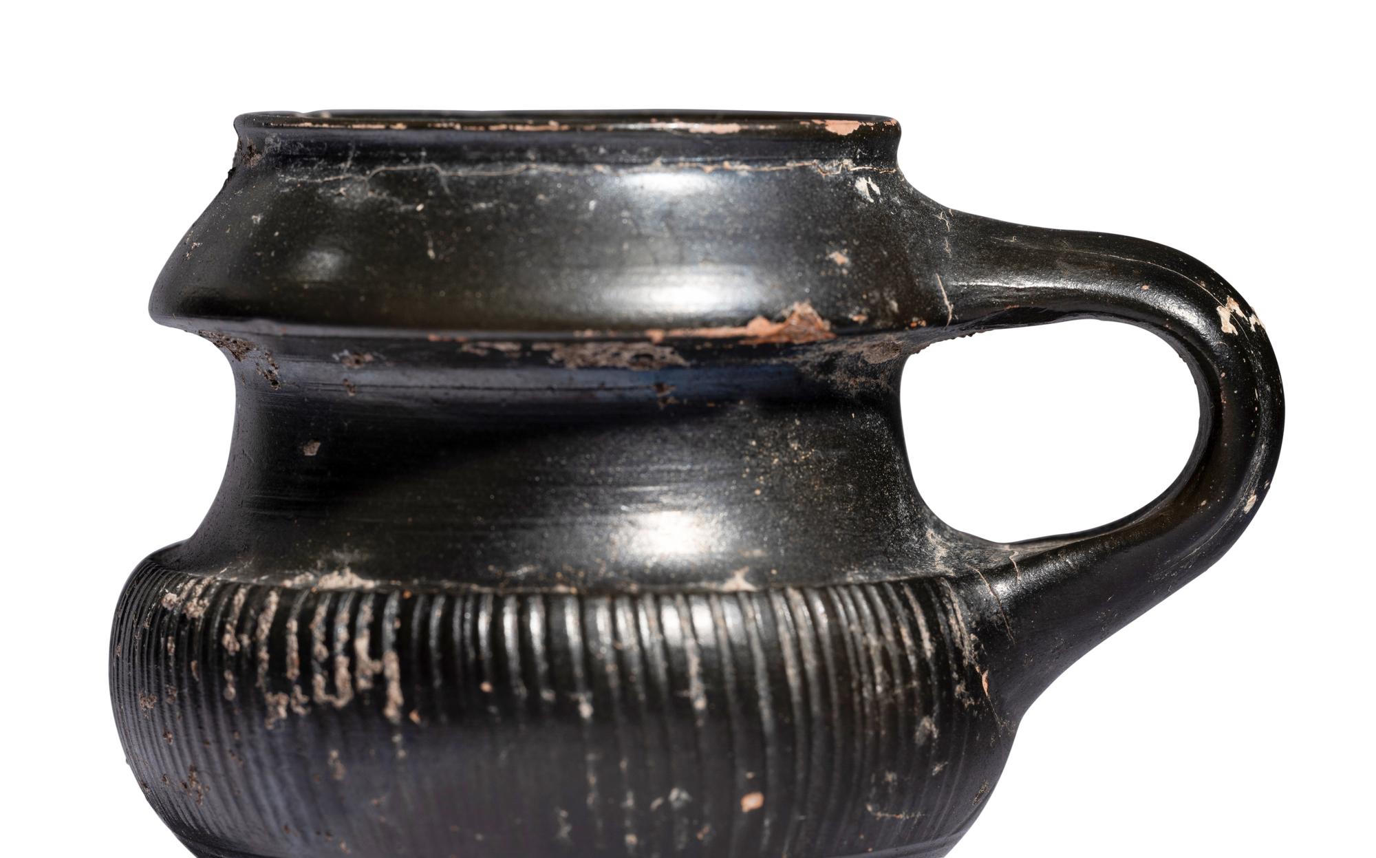 An Apulian Black-Glazed Oinochoe