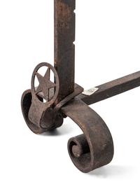 A Pair of Iron Andirons with Star Ornaments