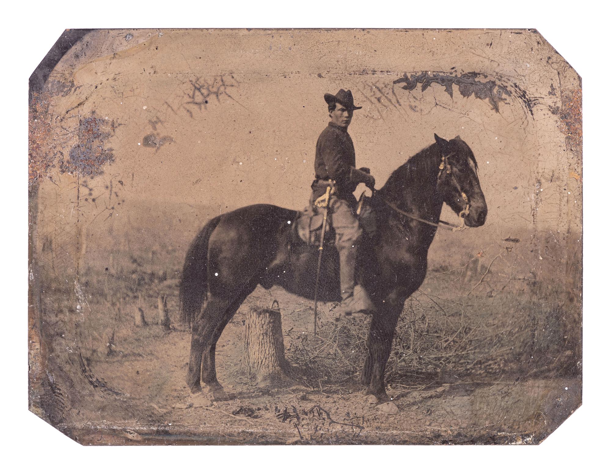 [CIVIL WAR]. Quarter plate tintype of a Federal cavalry soldier on horseback.