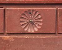 A Chippendale Carved And Red-Painted Chest Of Drawers