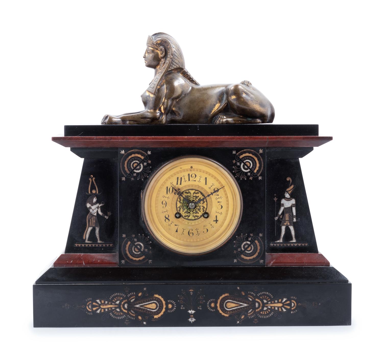 An Egyptian Revival Bronze Mounted and Parcel Gilt Mantel Clock