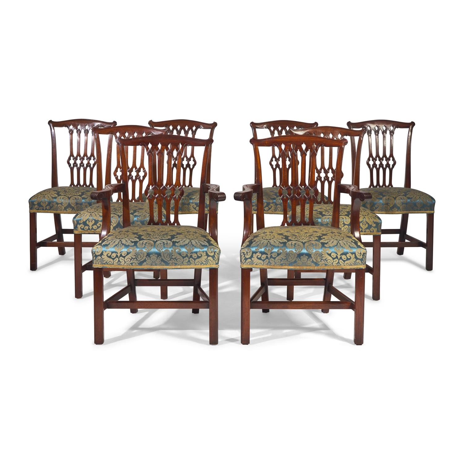 A Set of Eight George III Style Carved Mahogany Dining Chairs