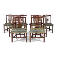 A Set of Eight George III Style Carved Mahogany Dining Chairs