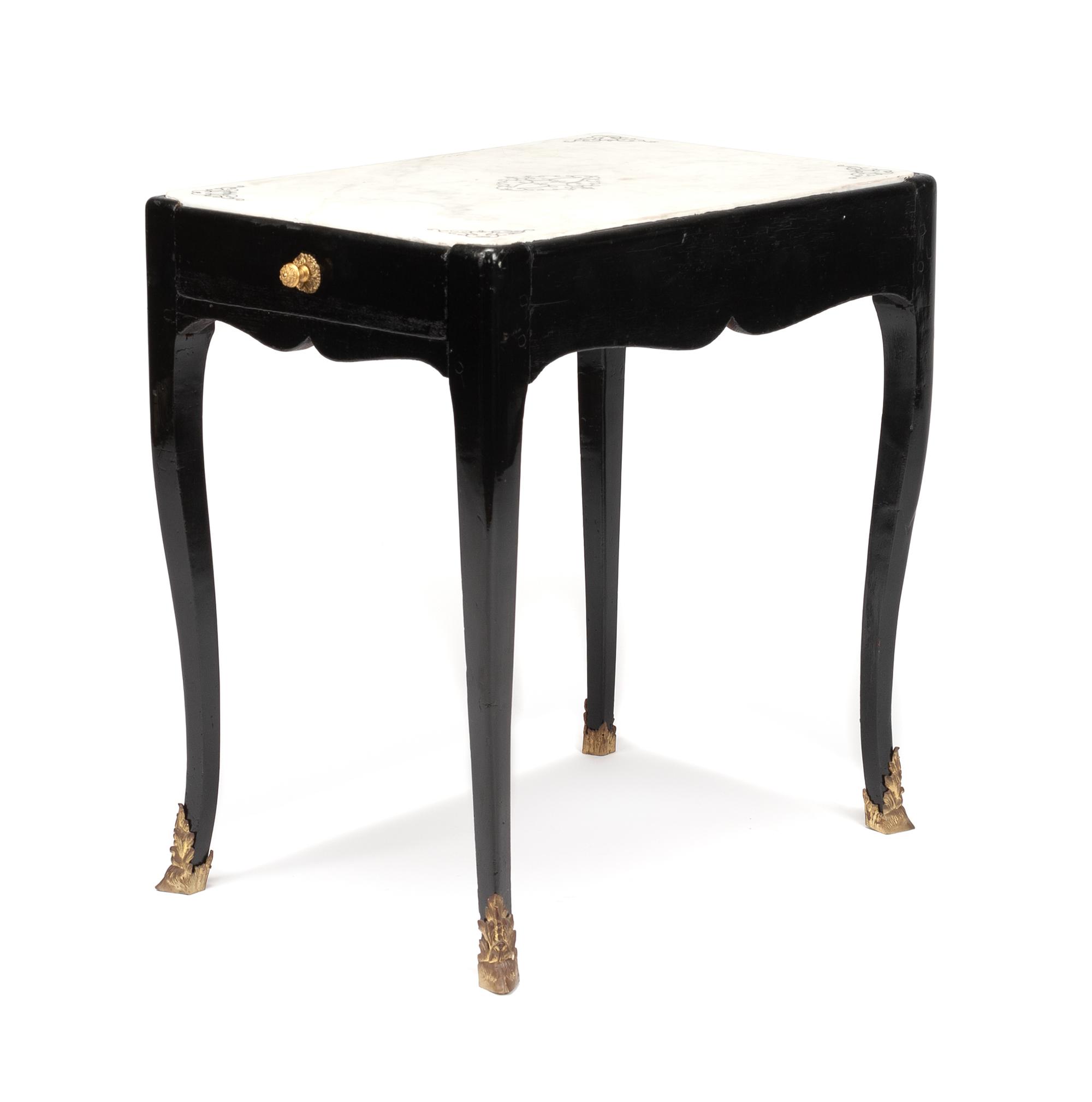 A Louis XV Ebonized Table Height 24 x width 15 3/4 x depth 23 1/2 inches. — 18TH CENTURY