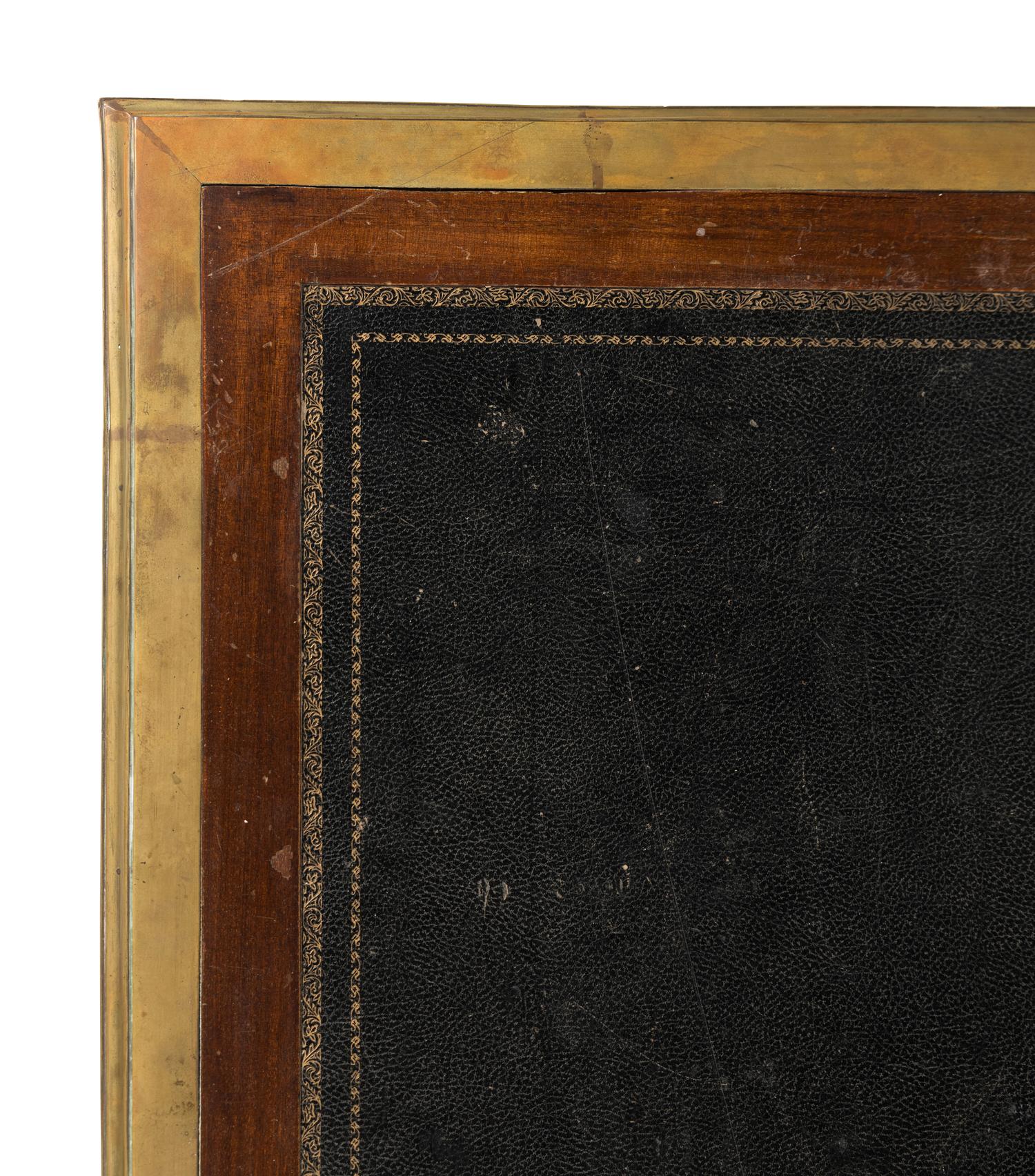 A Louis XVI Style Gilt Metal Mounted Mahogany Pedestal Desk