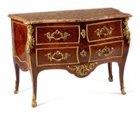 A Louis XV Style Gilt Bronze Mounted Kingwood and Parquetry Commode