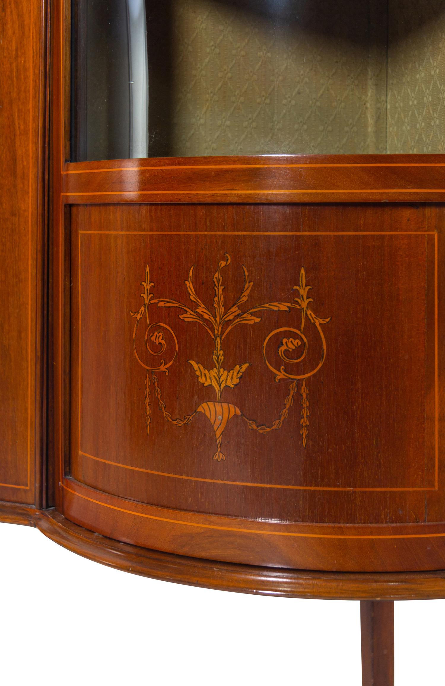 An Edwardian Mahogany and Marquetry Corner Vitrine
