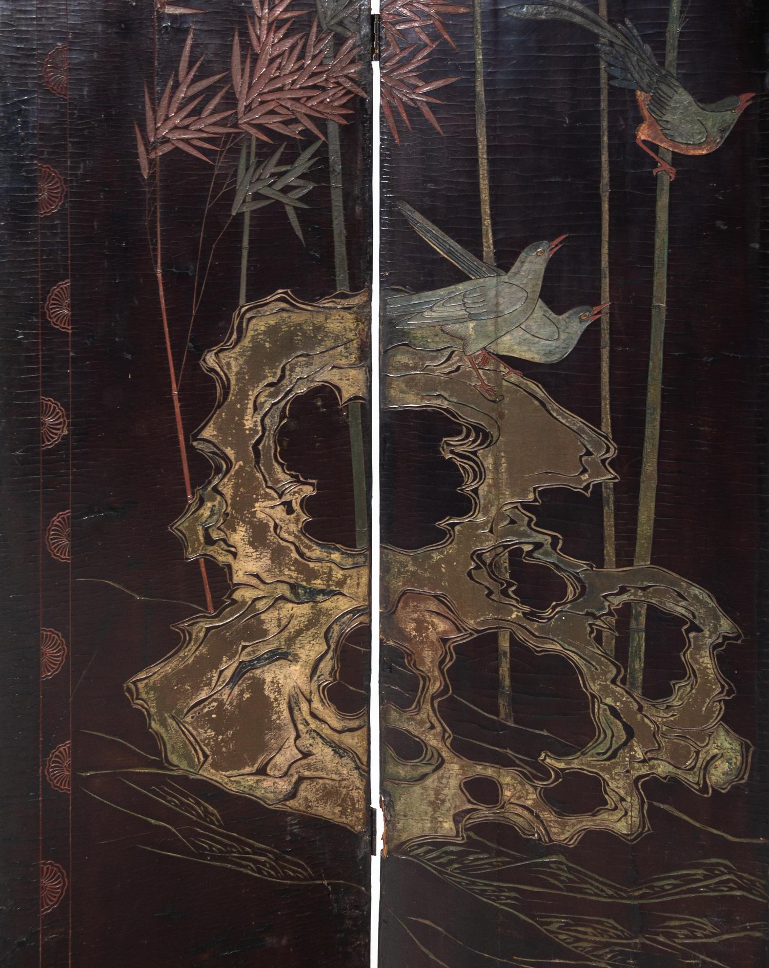 A Chinese Export Black Lacquered Four-Panel Floor Screen
