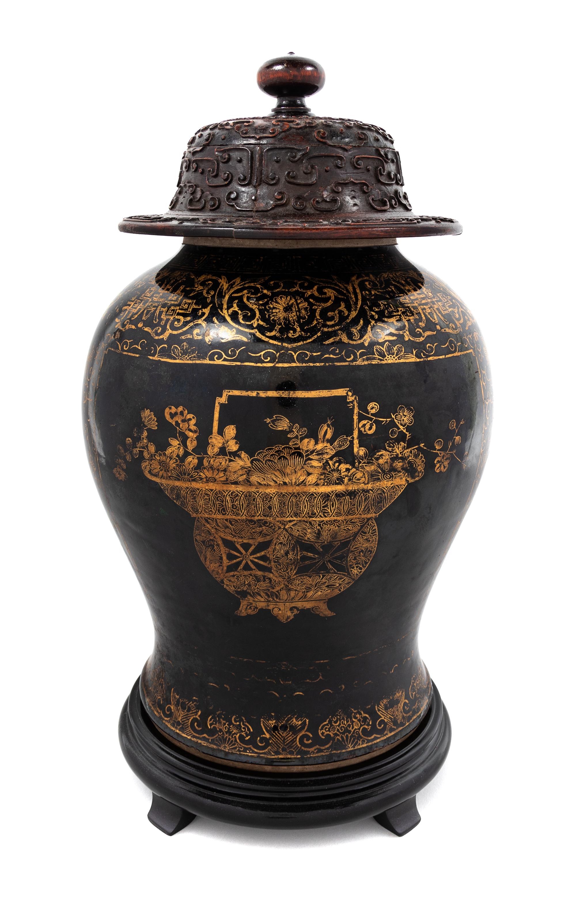 A Gilt Decorated Mirror Black Glazed Porcelain Baluster Jar Height 12 inches. — KANGXI PERIOD (1662-1722)