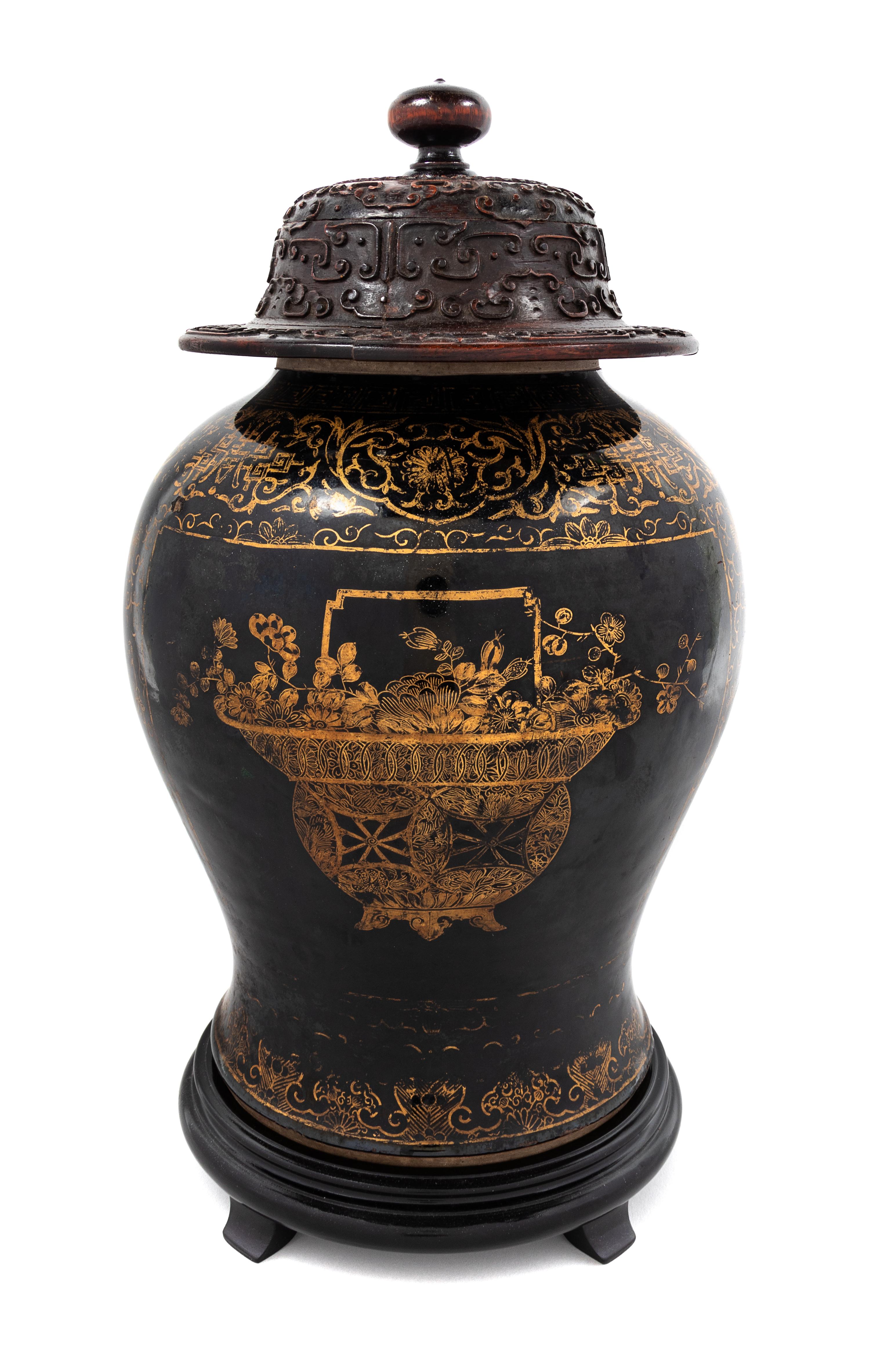 A Gilt Decorated Mirror Black Glazed Porcelain Baluster Jar Height 12 inches. — KANGXI PERIOD (1662-1722)