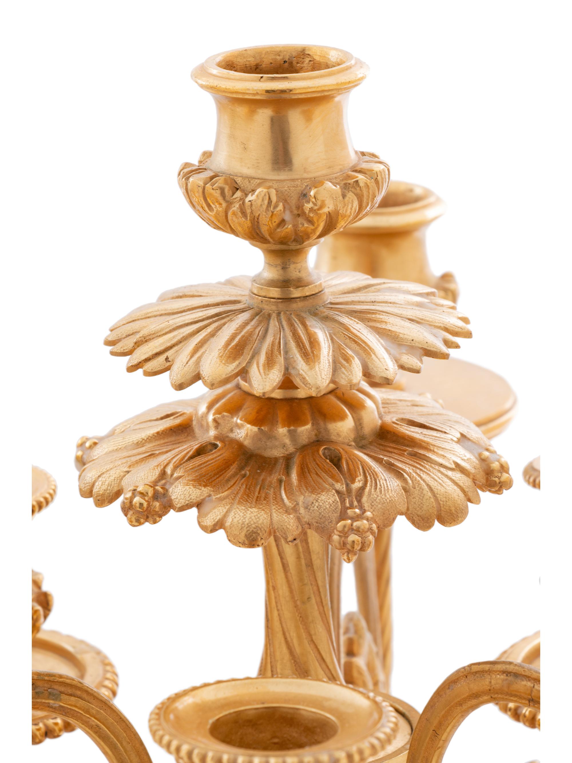 A Louis XV Style Gilt Bronze and Glass Table Garniture