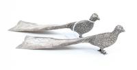 A Pair of Mexican Silver Castors, Maciel, each in the form of a peacock.