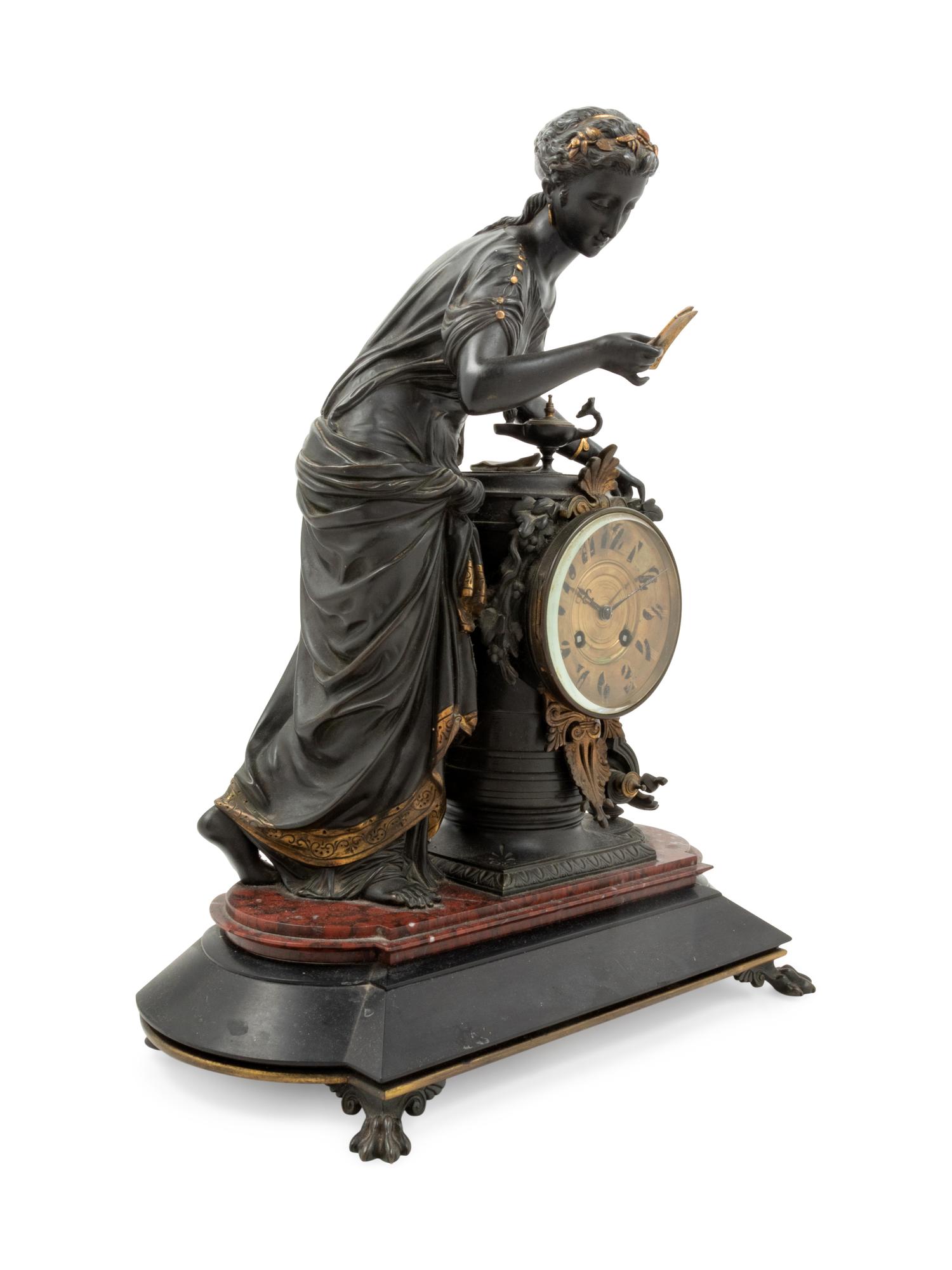 A French Gilt Bronze and Marble Figural Mantel Clock
