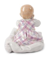 A Meissen Porcelain Figure of a Baby Feeding ,by Konrad Hentschel