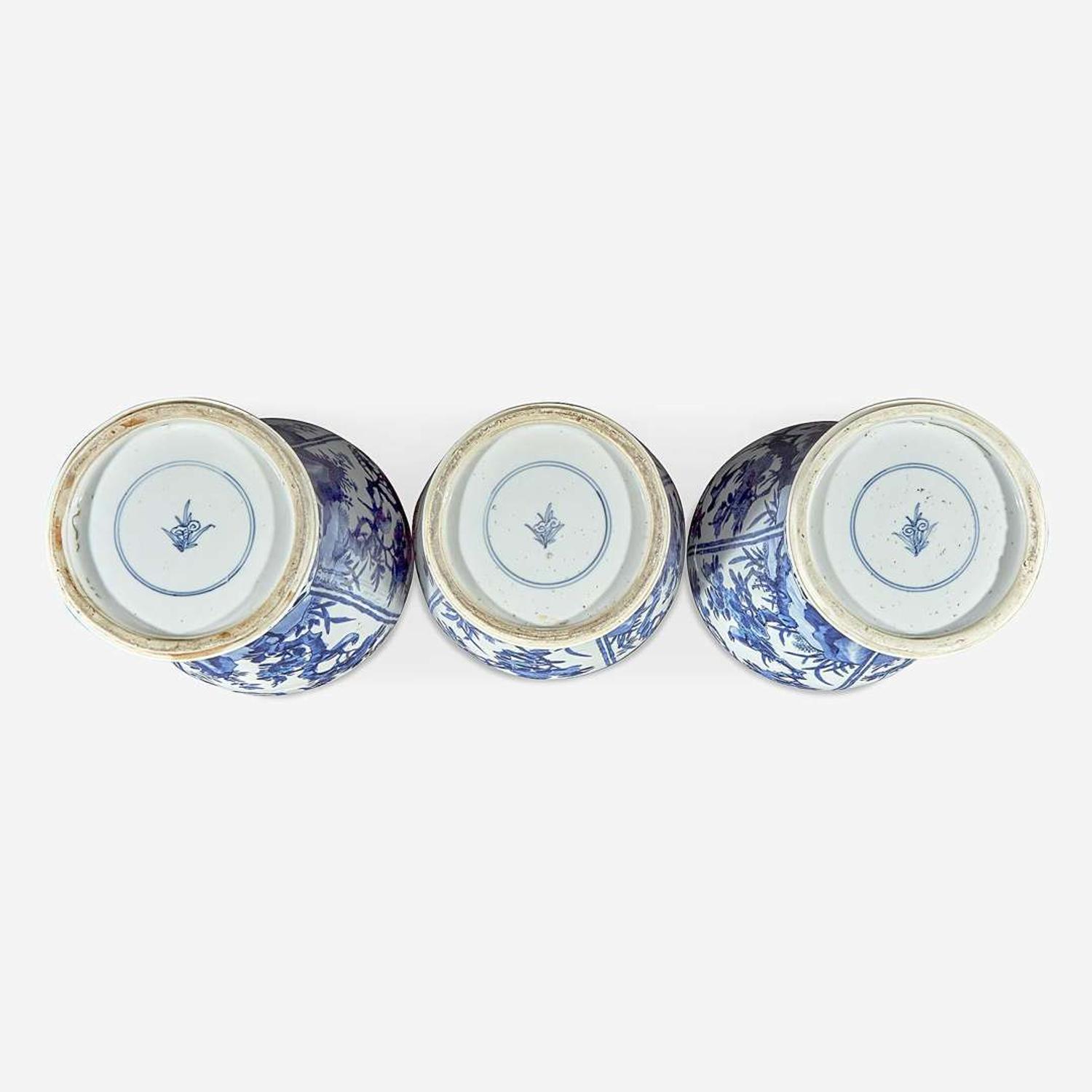 Three Chinese blue and white porcelain baluster vases and covers Kangxi period