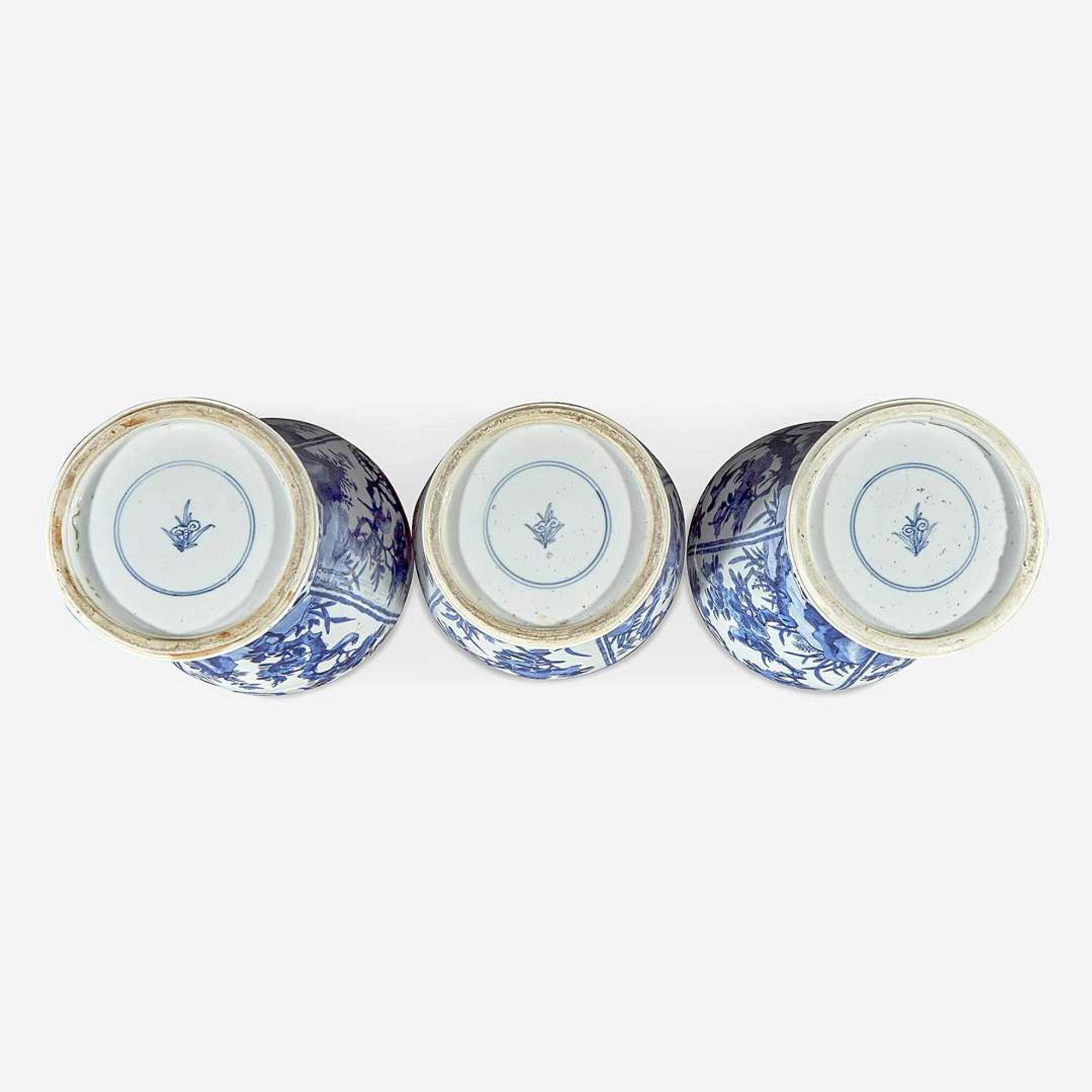 Three Chinese blue and white porcelain baluster vases and covers Kangxi period