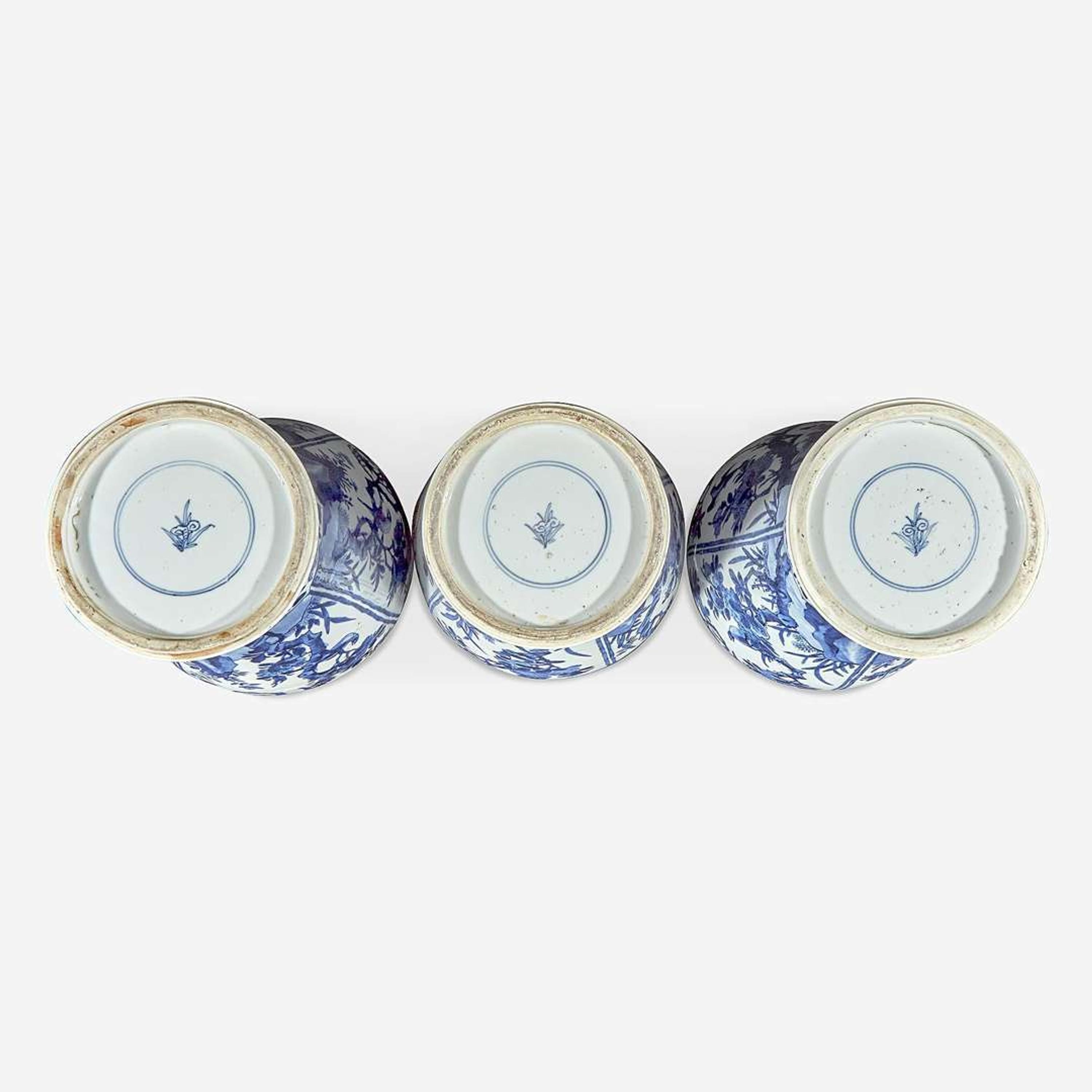 Three Chinese blue and white porcelain baluster vases and covers Kangxi period