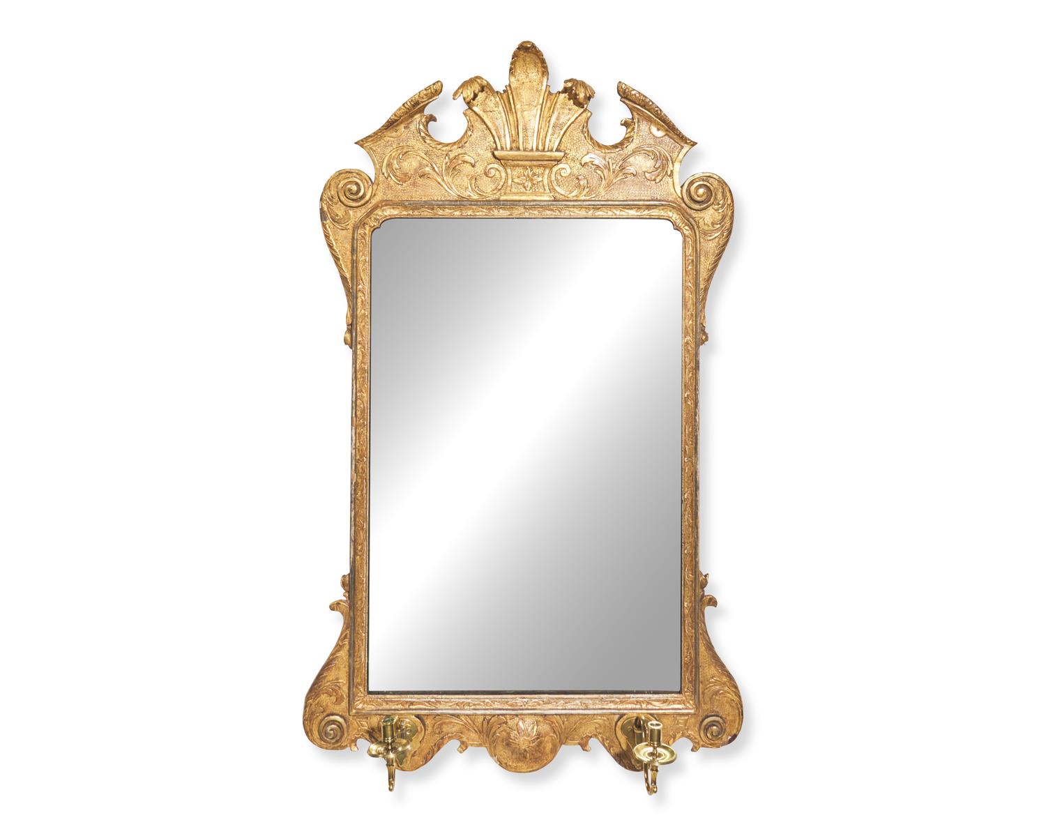 A George I giltwood and gesso looking glass, early 18th century