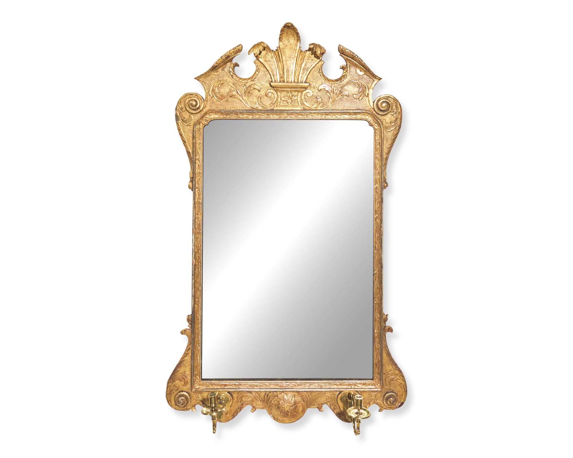 A George I giltwood and gesso looking glass, early 18th century
