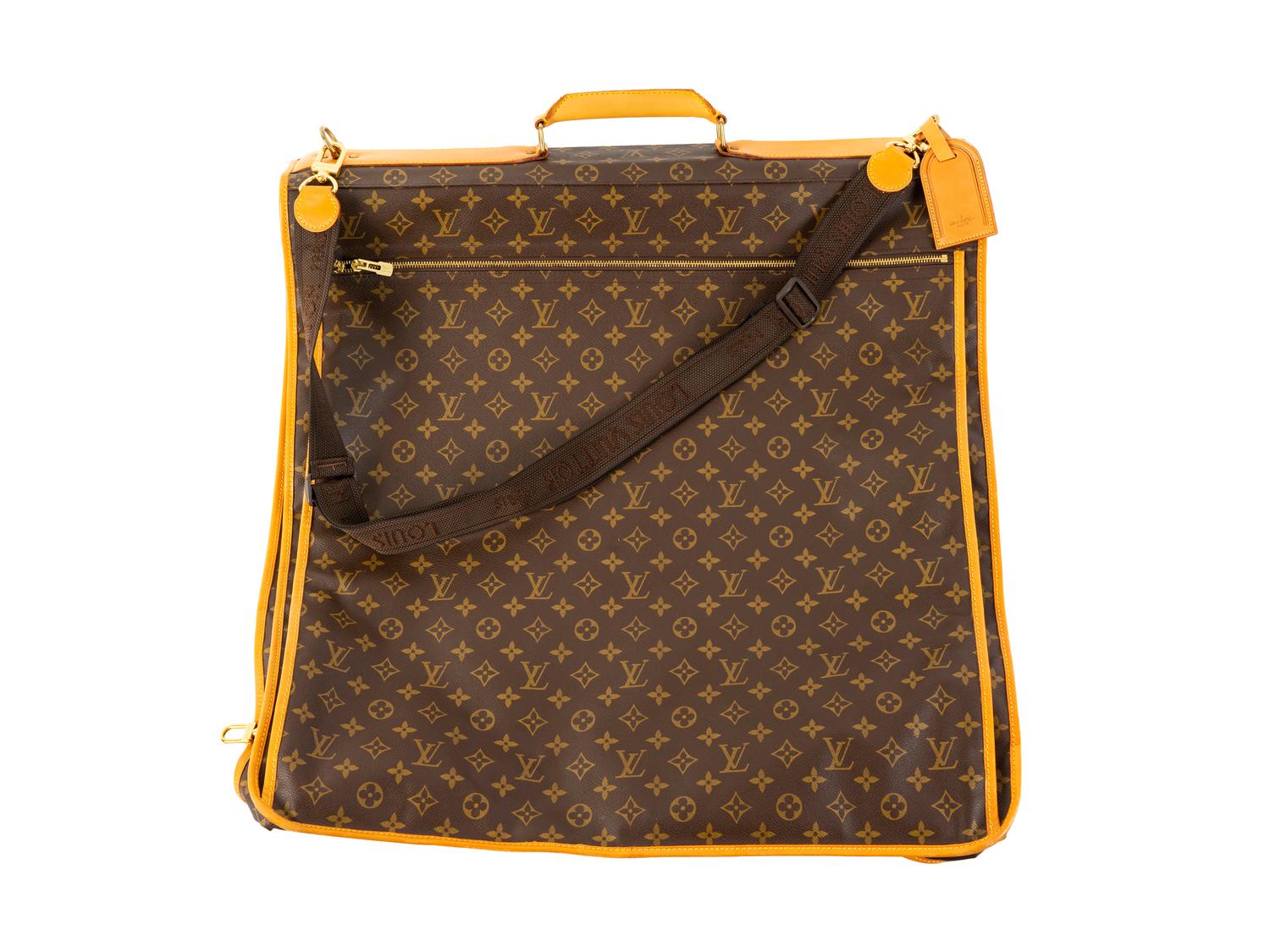 A Louis Vuitton Leather Garment Bag — 20TH CENTURY