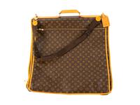 A Louis Vuitton Leather Garment Bag — 20TH CENTURY